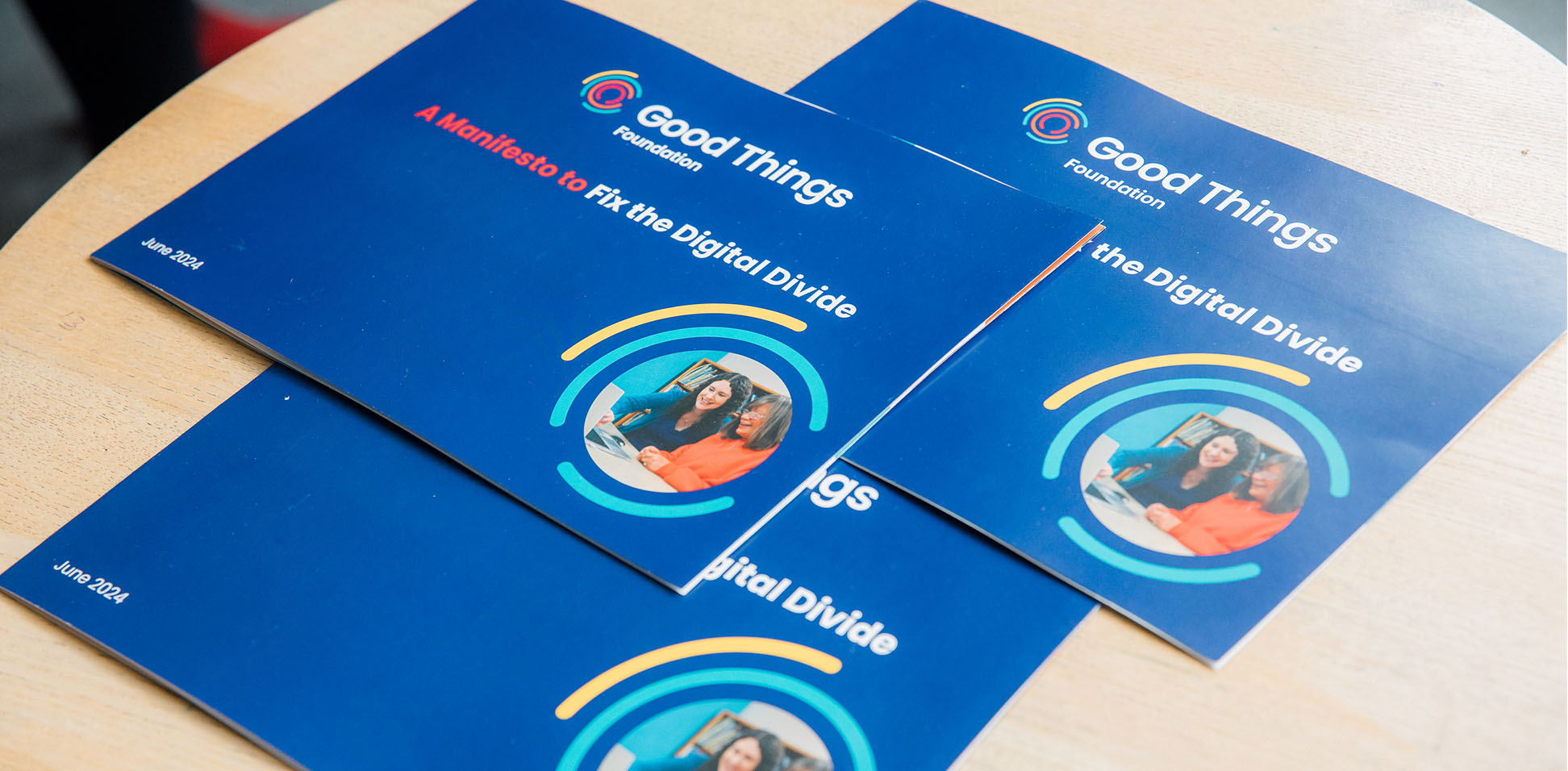This image shows a printed booklet of our Manifesto to Fix The Digital Divide